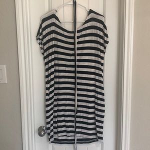 Black and white striped Piko dress with belt.